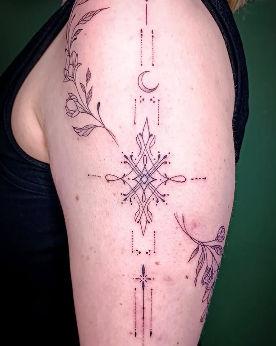 Fine line tatovering på arm